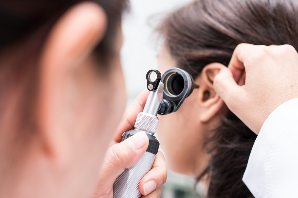 Doctor Looking Into Patients Ear