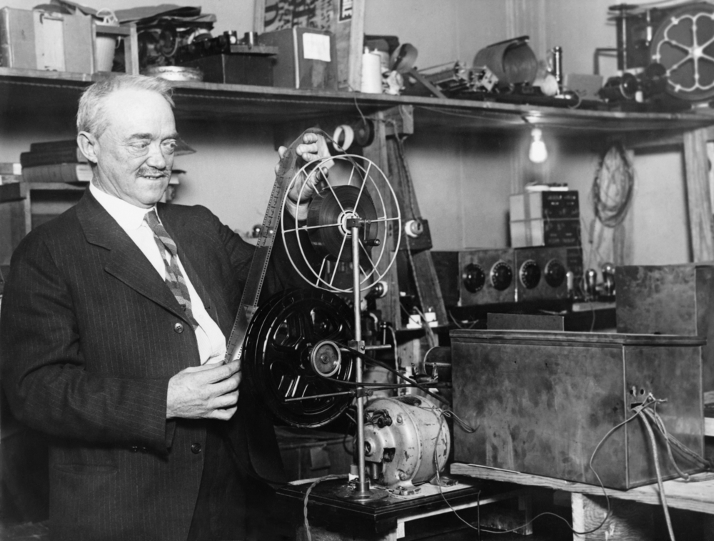 Charles Francis Jenkins working on his early motion picture device later known as the television.